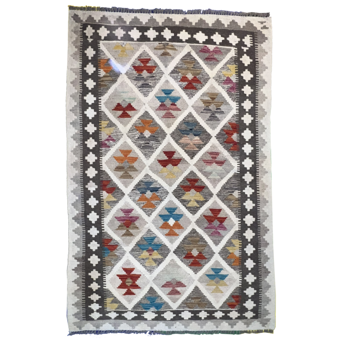 Kilim Rug Guide: Flatweave Techniques & Tribal Design Traditions