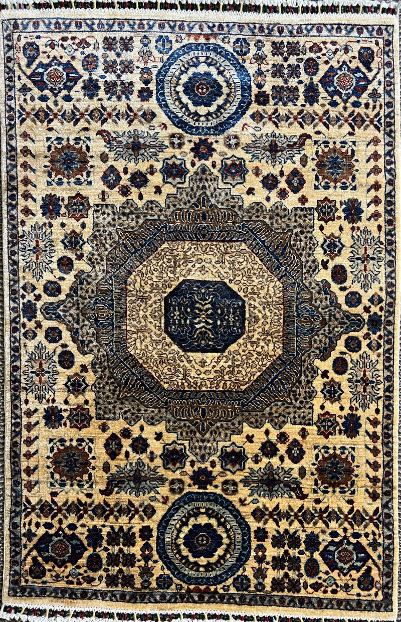 Hand-knotted Mamluk rug with an indigo octagon medallion on an ivory field