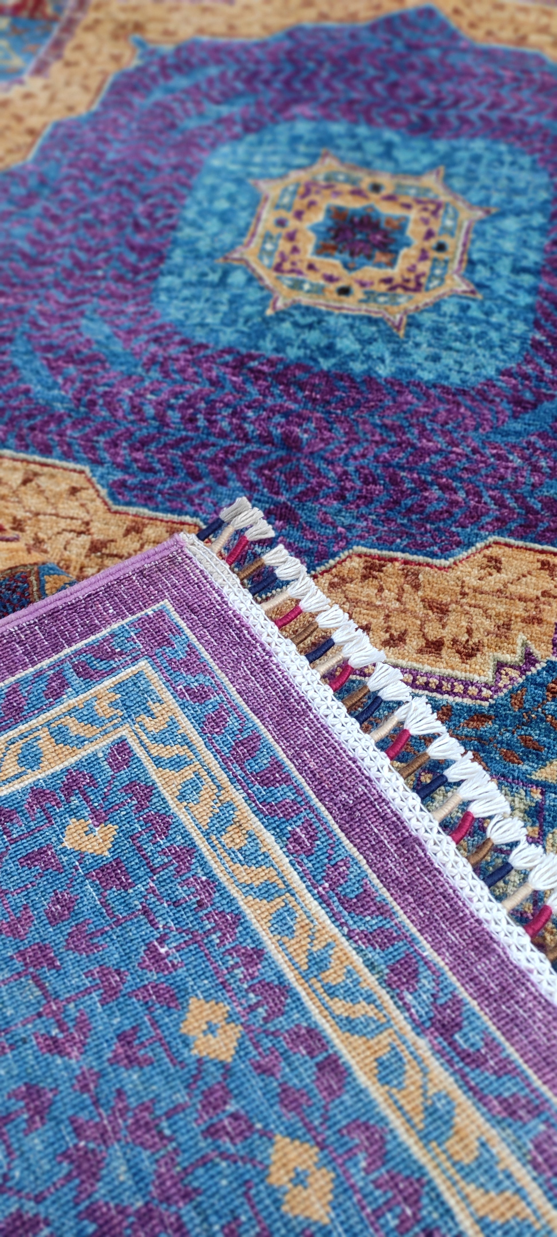 nan handwoven handwoven rug, traditional pattern, wool, detail view