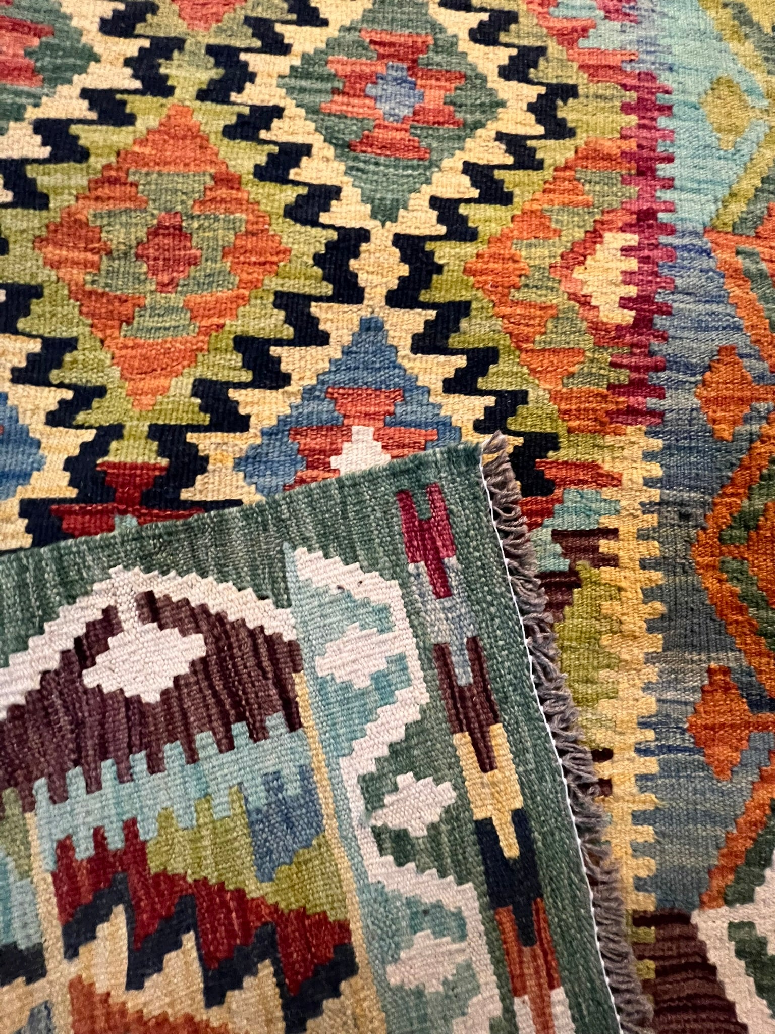 nan handwoven handwoven rug, traditional pattern, wool, detail view