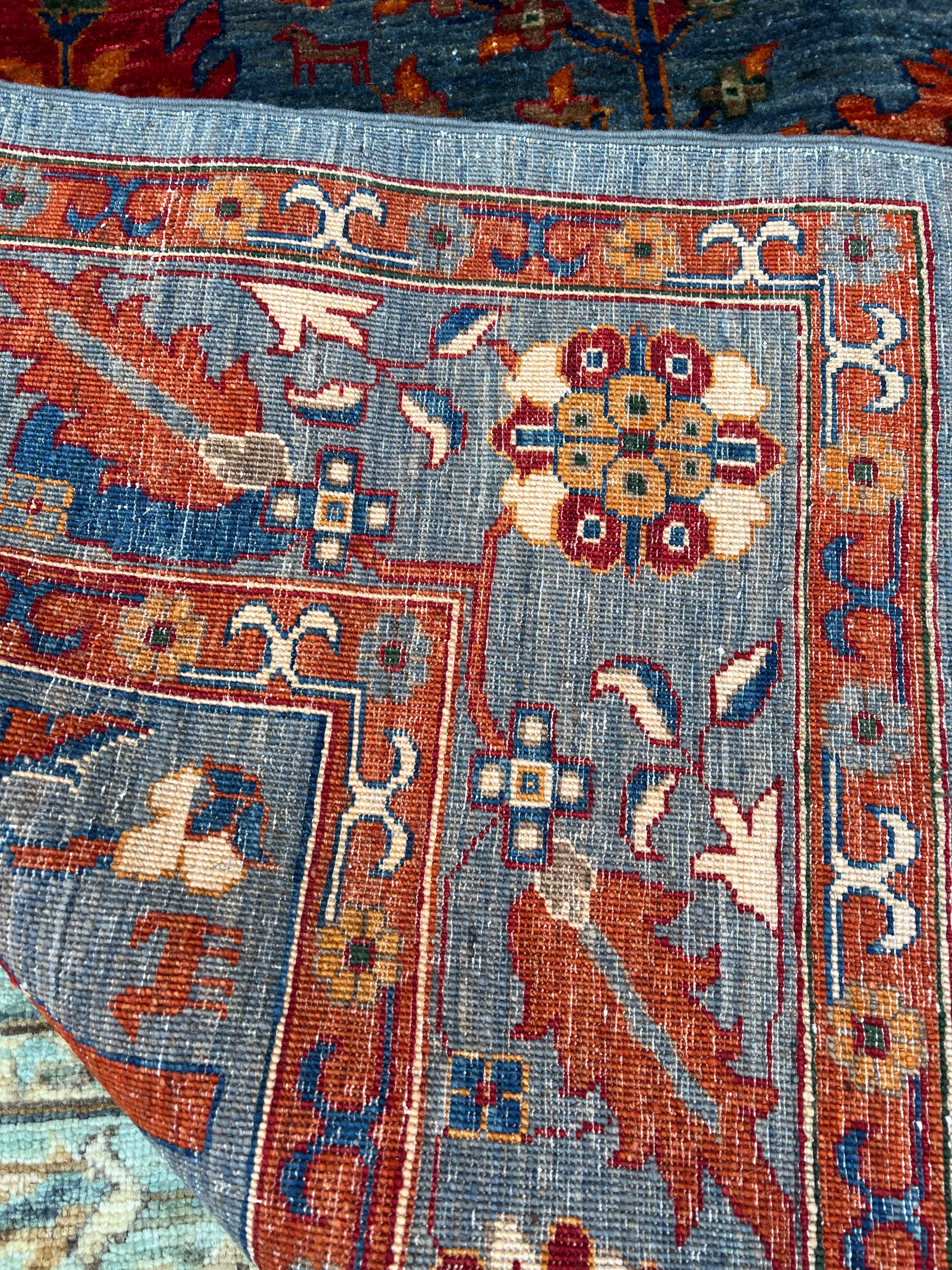 nan handwoven handwoven rug, traditional pattern, wool, detail view