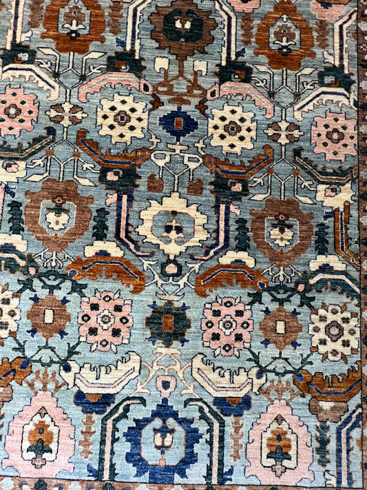 Afghan Haris design rug hand-knotted wool artisan geometric pattern traditional Oriental craftsmanship premium area rug

