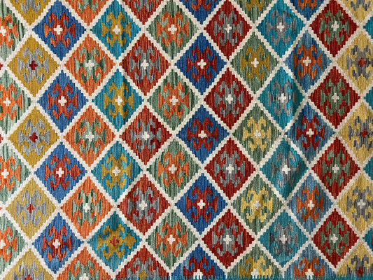 Afghan Kilim rug handwoven wool texture detail tribal artisan flatweave craftsmanship