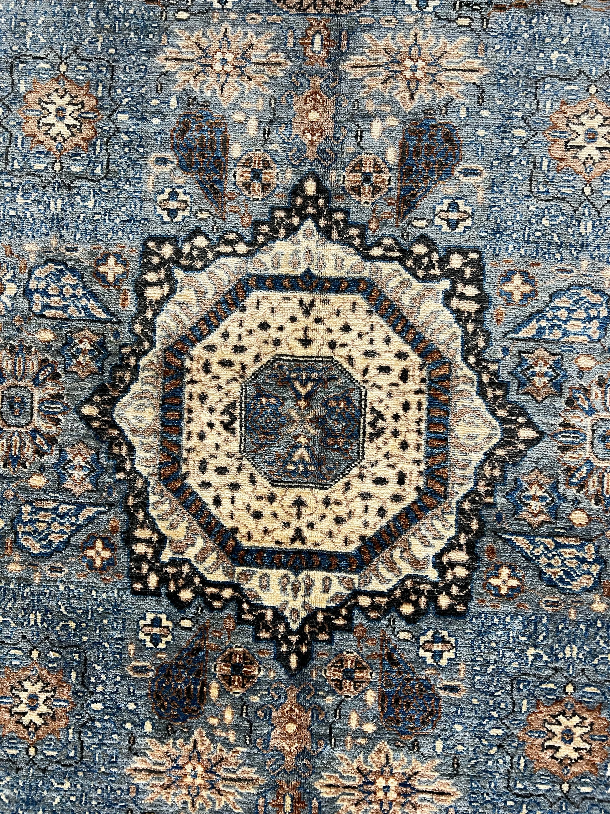 Afghan Mamluk Oriental rug hand-knotted wool texture artisan craftsmanship detail

