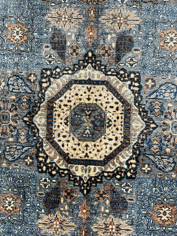 Afghan Mamluk Oriental rug hand-knotted wool texture artisan craftsmanship detail

