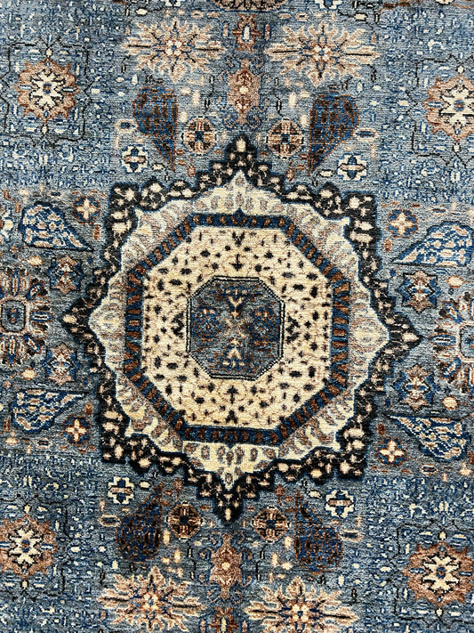 Afghan Mamluk Oriental rug hand-knotted wool texture artisan craftsmanship detail

