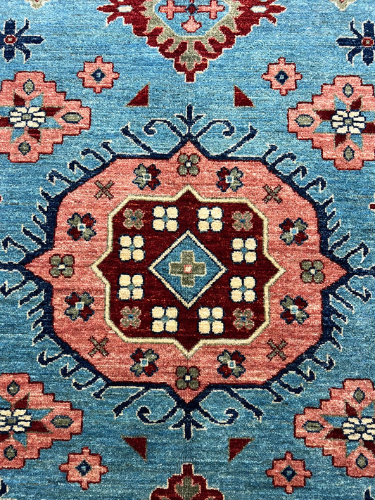 Afghan Oriental Mamluk rug hand-knotted wool closeup artisan texture detail

