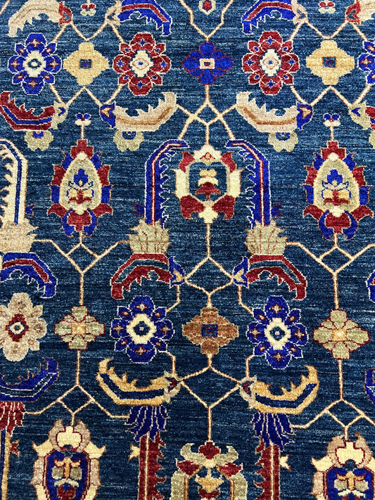 Afghan hand-knotted Oushak rug showing traditional motifs and premium Ghazni wool texture