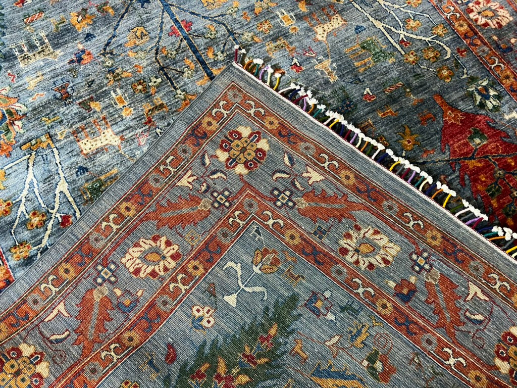 Khurjin Rug — Tree of Life (Sky Blue/Multi) Hand-Knotted Wool – 9′8″ × 6′7″ | Afghan Craftsmanship · Afghan Tree of Life Khurjin rug hand-knotted wool tribal premium traditional artisan sky blue luxury area rug


