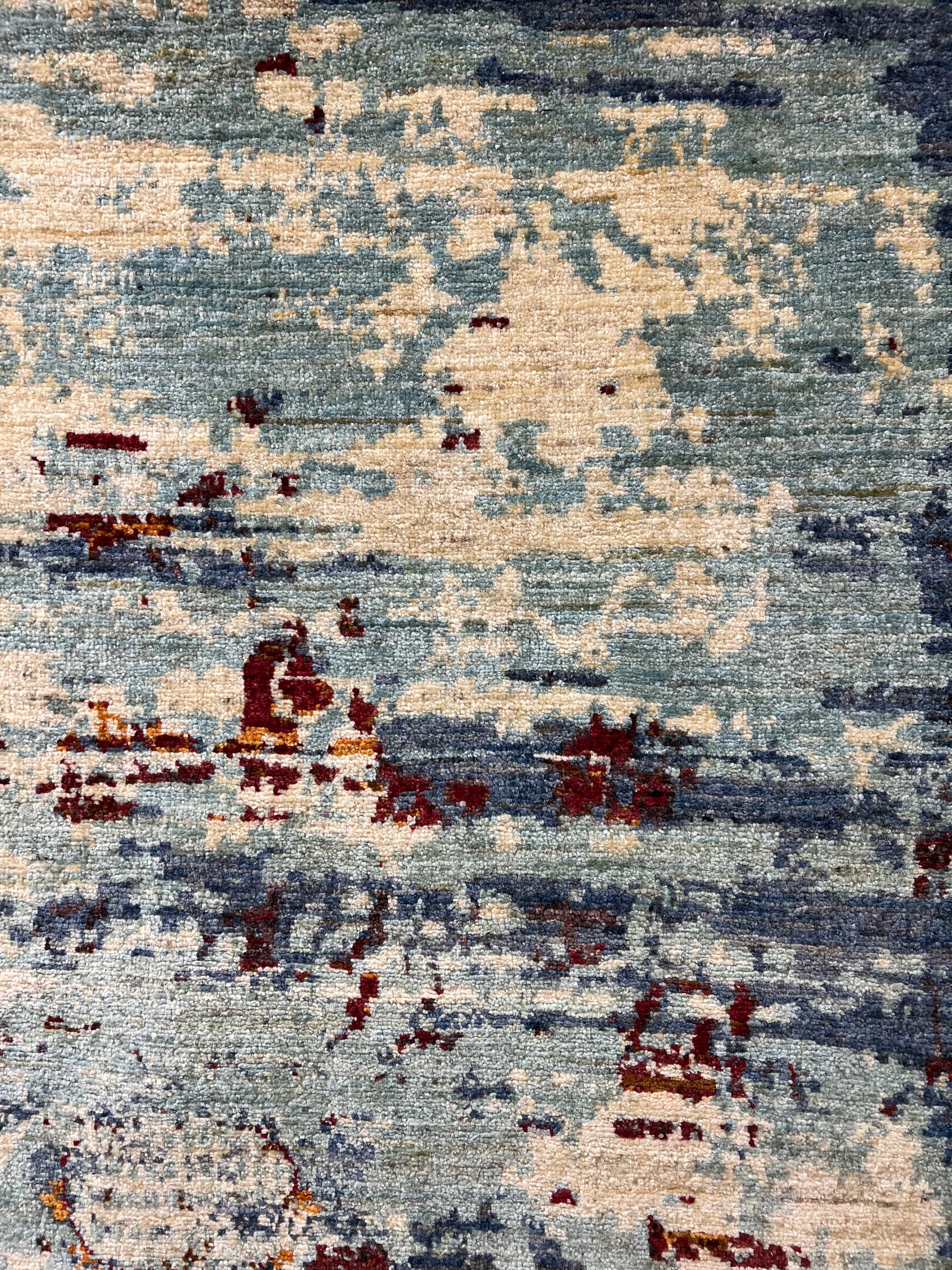 Contemporary designer rug handwoven wool pattern closeup luxury artisan weave

