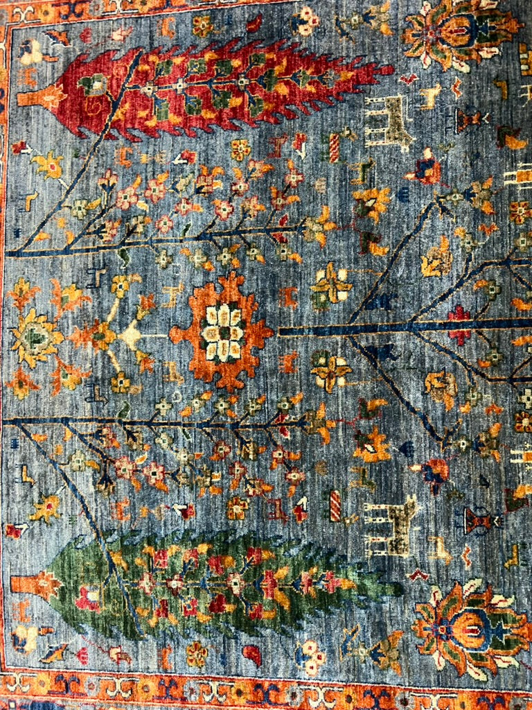 Khurjin Rug — Tree of Life (Sky Blue/Multi) Hand-Knotted Wool – 9′8″ × 6′7″ | Afghan Craftsmanship · Luxury Khurjin Tree of Life rug Afghan hand-knotted wool tribal traditional artisan sky blue area rug

