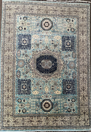 Mamluk hand-knotted rug detail - intricate geometric medallion and Afghan craftsmanship